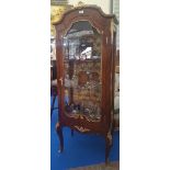 A REALLY GOOD ROSEWOOD CONTINENTAL DISPLAY CABINET with glazed exterior, shelves and ormolu mounts.