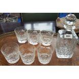 A SQUARE CUT CRYSTAL WHISKEY DECANTER & SIX TUMBLERS.