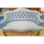 A 19TH CENTURY DEEP BUTTONED TWO SEATER SALON SETTEE.