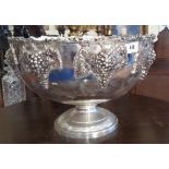 A LARGE SILVER-PLATE GRAPE & VINE PUNCH BOWL.