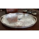 A LOVELY LARGE OVAL SILVER PLATED SERVING TRAY with pierced sides, 2ft wide.