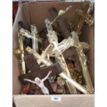 A LARGE QUANTITY OF CRUCIFIXES to include brass examples.