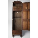 A MAGNIFICENT 19TH CENTURY OAK GUN CABINET WITH ARCHITECTURAL DESIGN with R & J Watkins, 40