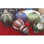 A COLLECTION OF ASSORTED HANGING GLASS LANTERNS.