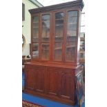 A REALLY GOOD VICTORIAN PITCH PINE FOUR DOOR BOOKCASE.