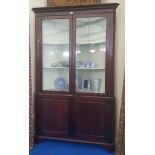 A 19TH CENTURY MAHOGANY CORNER CABINET with glazed top.