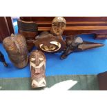 A QUANTITY OF VARIOUS CARVED AFRICAN FIGURES.