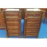 A GOOD PAIR OF FIVE DRAWER MARBLE TOPPED BEDSIDE CABINETS.