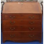 A GEORGIAN MAHOGANY BUREAU with fitted interior.