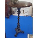 A GOOD CAST IRON PUB TABLE with a hardwood top.