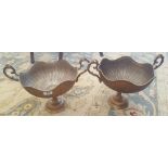 A LOVELY PAIR OF BRONZED CENTRE PIECES with swagged handles and wavy outline.