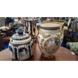 A GERMAN BLUE & WHITE SOUP TUREEN, along with a large twin handled jardiniere with hand painted