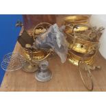 A QUANTITY OF BRASS CENTRE PIECES, candle holders and other items.
