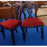 A SET OF EIGHT 20TH CENTURY MAHOGANY SPOON BACK DINING CHAIRS with turned fluted front supports