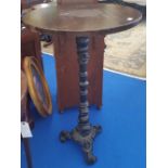 A GOOD CAST IRON PUB TABLE with a hardwood top.