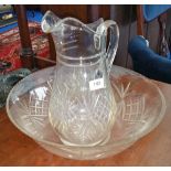 A CUT WASH GLASS JUG AND BOWL.