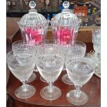 A LOVELY PAIR OF TALL GLASS RIBBED BONBON JARS & LIDS, WITH SIX WELL CUT DESSERT GLASSES.