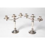 A PAIR OF IRISH SILVER THREE-BRANCH CANDELABRA,with raised mask decoration, Celtic knot and scroll