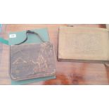 TWO LEATHER EMBOSSED POUCHES/LETTER HOLDERS and two others.