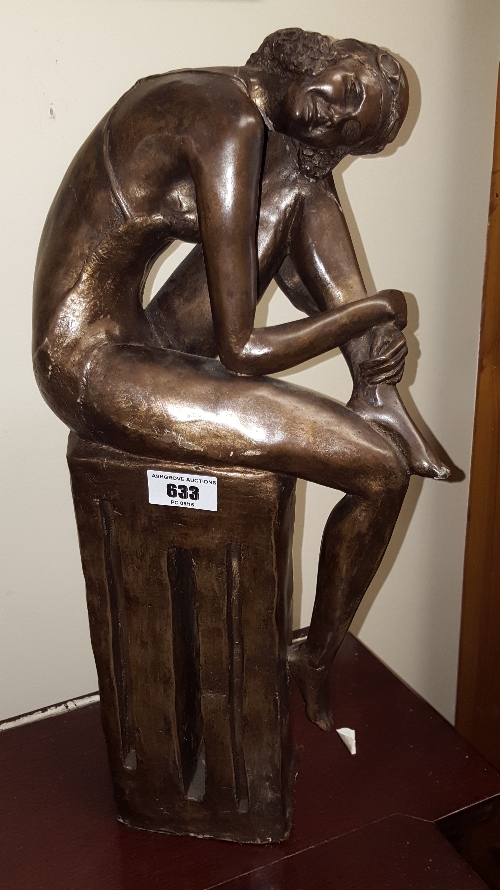 A 20th Century Bronzed Sculpture of an Art Deco Young Woman; monogrammed to base KN no. 6/9, 42 cm