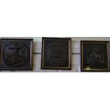 A Set of Three Bronze Effect Plaques.