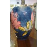 A Moorcroft Pottery Vase of Oviform Tubelined in the Magnolia Pattern; in pink, yellow and green