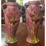 A Pair of Early 20th Century Torquay Pottery Tapering Vases; decorated with birds in flight on a