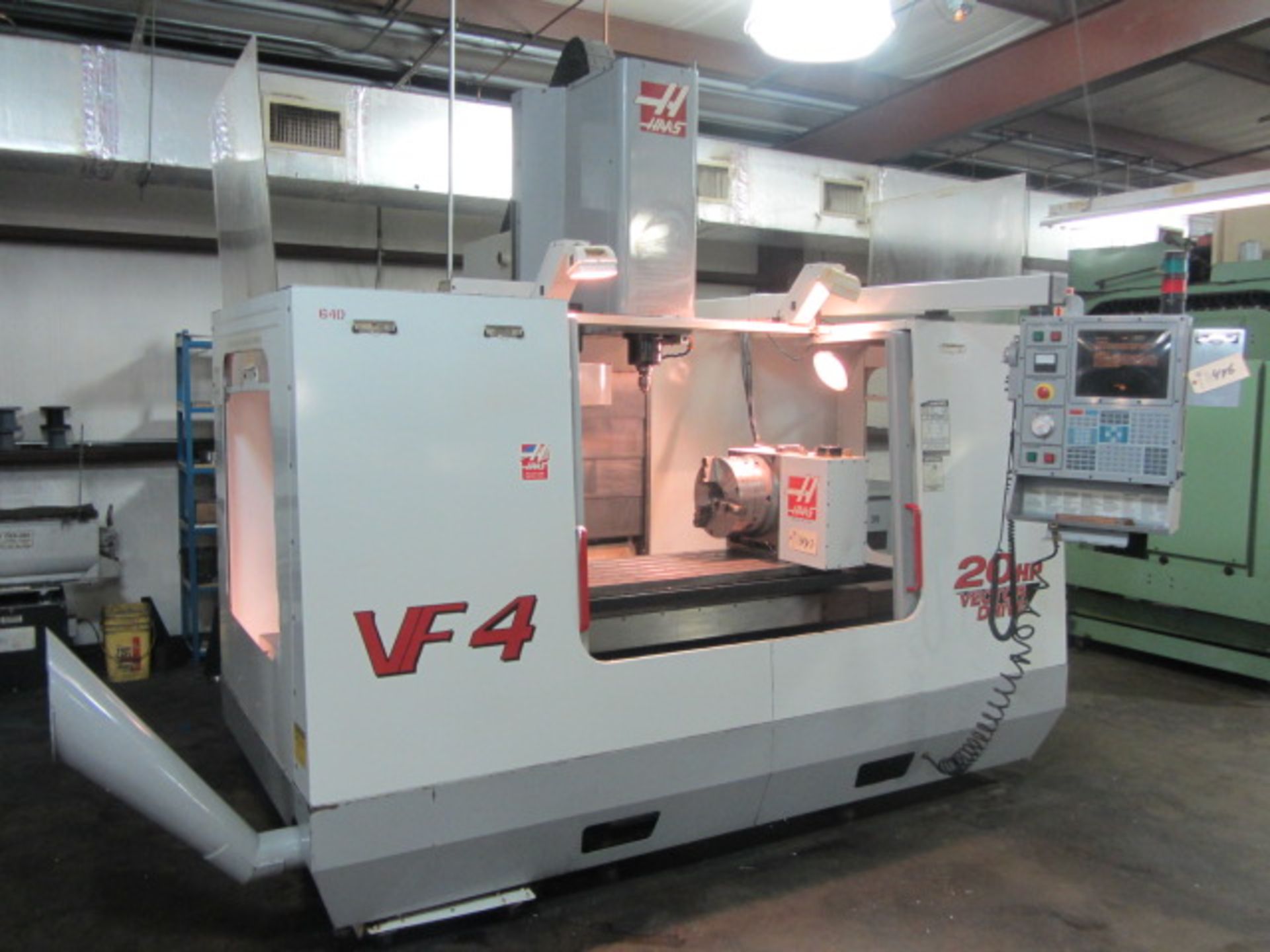 Haas Model VF-4 CNC Vertical Machining Center with 18'' x 52'' Table, 50'' X-Axis, 20'' Y-Axis, 25''