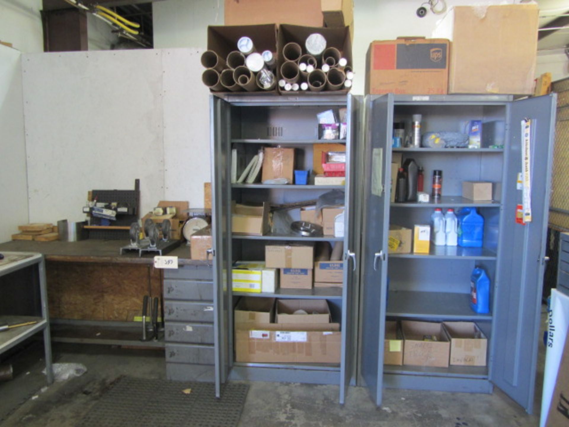 Contents of Shipping Area including (2) Cabinets, (2) Workbenches