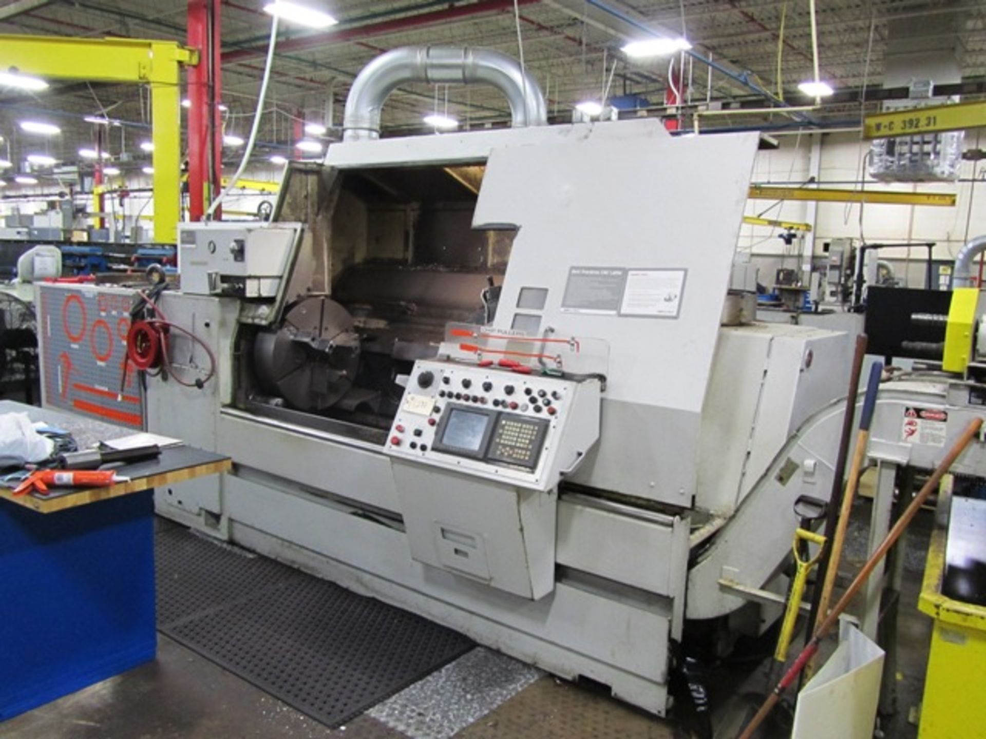 Warner & Swasey Model SC-28 CNC Turning Center with 28'' Maximum Turning Diameter, 28'' 3-Jaw Scroll