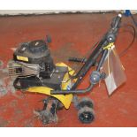 POLICE > Heavy duty rotavator with Briggs & Stratton motor.