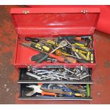 POLICE > Metal toolbox containing various tools.