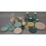 Quantity of Poole pottery dinnerware including teapots and plates