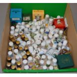 120 assorted ceramic and glass thimbles including Royal Doulton, Spode, Cloisonne , Sutherland,