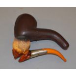 Meerschaum pipe in the form of a man's head with white metal collar stamped "Y & Co.
