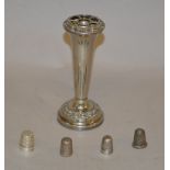 2 Silver thimbles together with 2 possibly silver plated examples and a silver plated candlestick