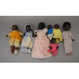 Seven composition black dolls, height of tallest 48 cm. Conditions vary.