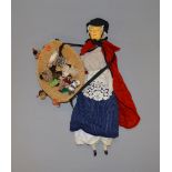 Peddler doll, ceramic head, hands and feet, kid leather body, with basket with dolls,