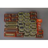 OO Gauge. 30+ boxed rolling stock including VG Wrenn examples. Some dusty boxes.