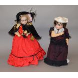 Two reproduction bisque head dolls, height of both approx. 70 cm.