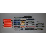 OO Gauge/H0 scale mixed lot. Includes Tri-ang locomotive & 24 assorted rolling stock.