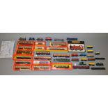 OO Gauge. Mixed lot includes 4 locomotives & 25+ boxed & unboxed rolling stock.