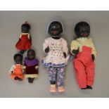Five hard plastic black dolls, height of tallest 56cm. Conditions vary.