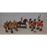 12 x Elastolin (Germany) large scale figures, mostly bandsmen and one mounted figure.