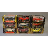 9 Boxed 1:18 Bburago models including Lancia, Alfa Romeo and Corvette examples.