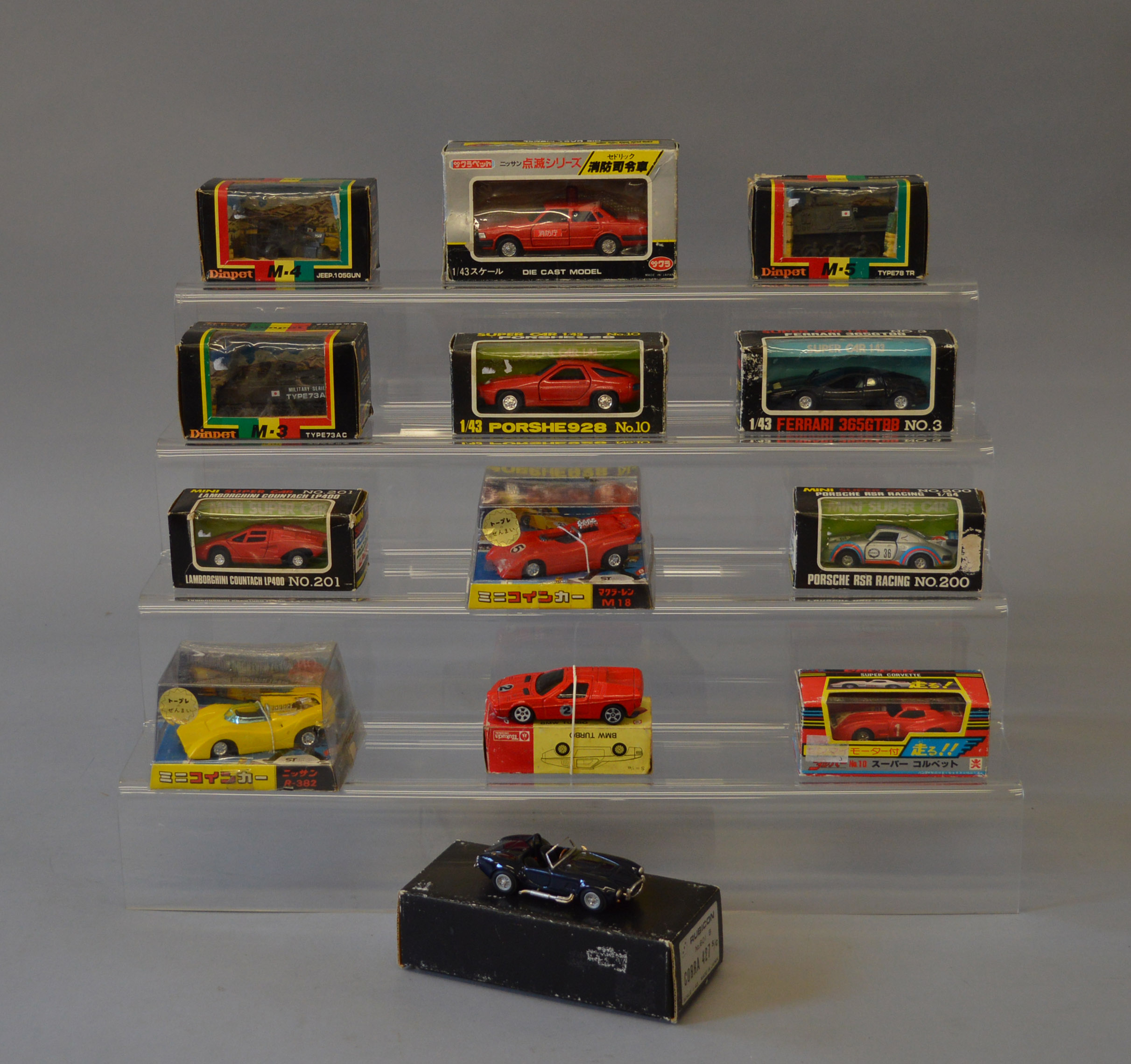 13 x diecast models by Bandai, Diapet and similar Japanese made diecast models.