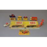 Three boxed Matchbox models: #18 Caterpillar Bulldozer; #73 Ferrari Racing Car;