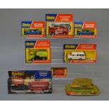 Eight Dinky Toys: #449; #285; two #128; #410; #675; #300; #274. Overall VG/E in F-VG boxes.