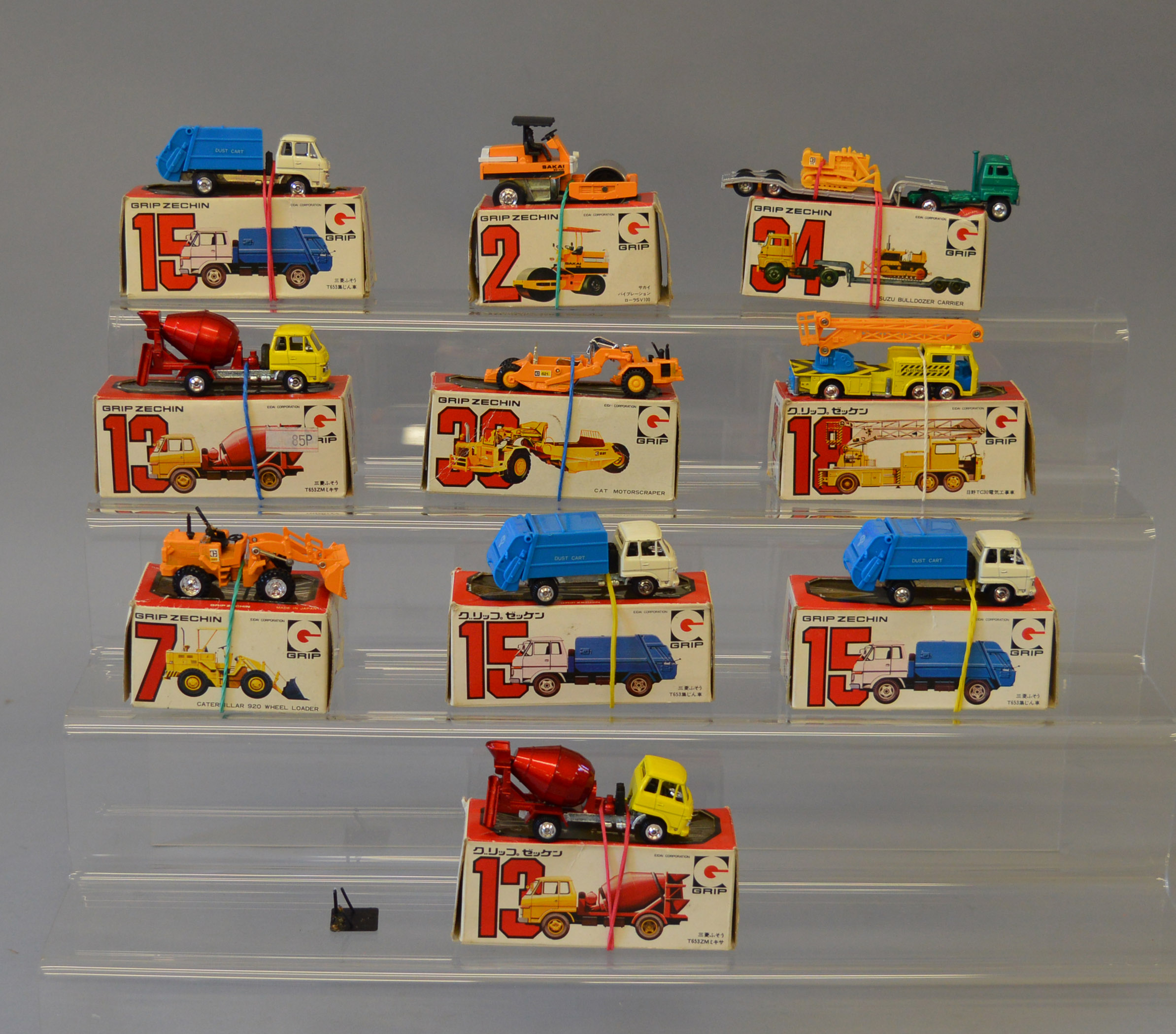 10 x Grip Zechin (Japan) diecast and plastic models, all trucks and construction models.