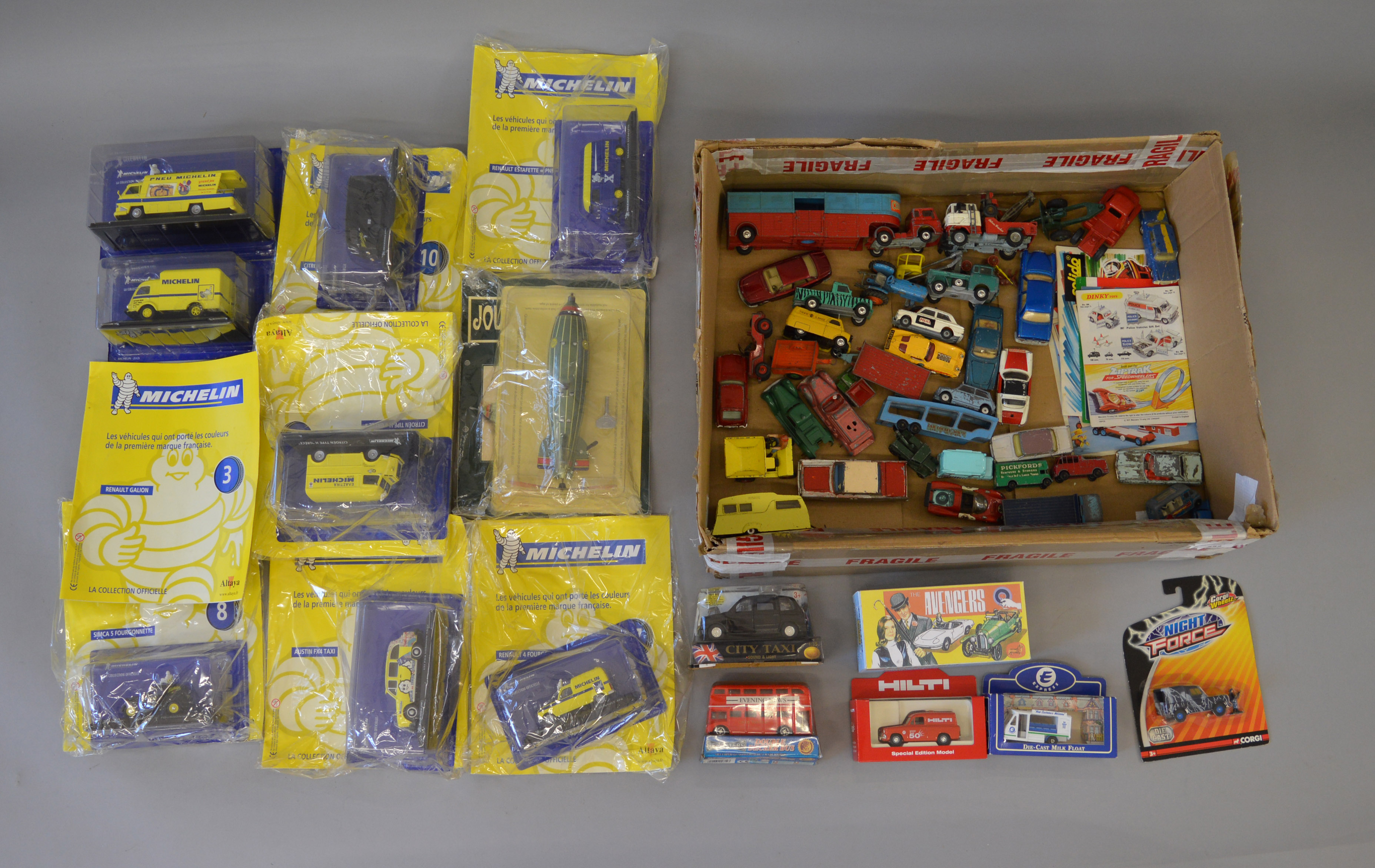 Approx 40 assorted playworn diecast models together with some vintage catalogues and magazine issue